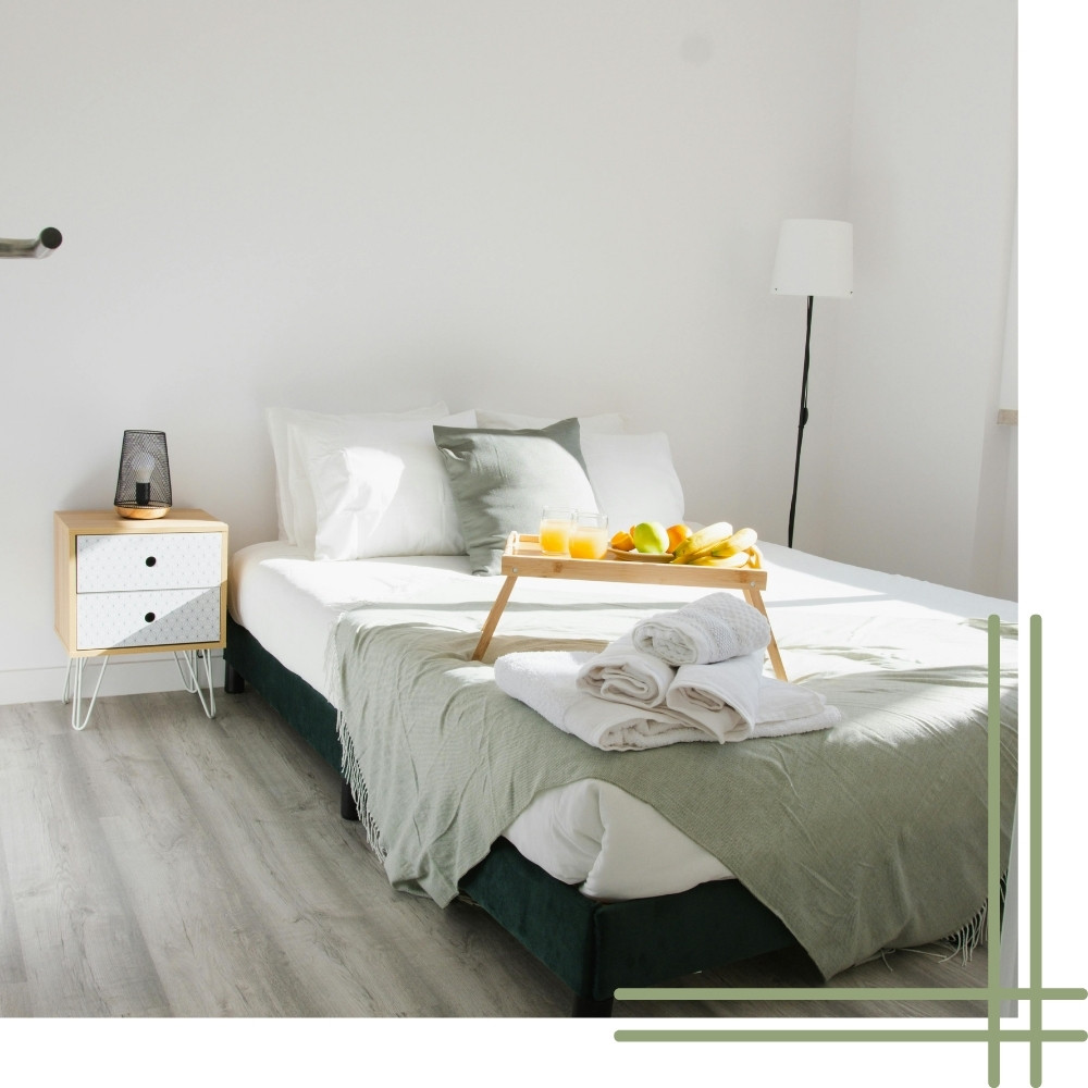 Airbnb host cleaning guide in Kent WA featuring a sanitized and guest ready rental space with fresh linens and organized decor